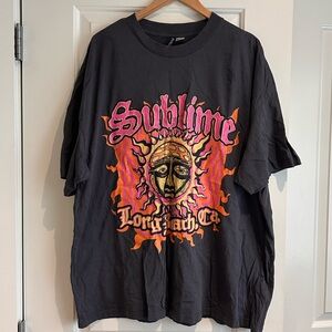 Brand new Sublime t-shirt. Divided. 100% cotton.